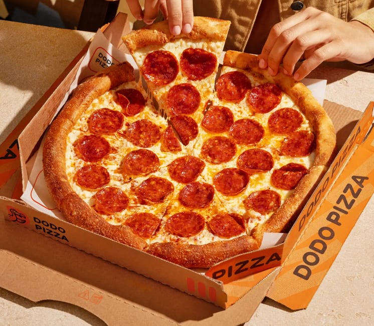 Pizza on picnic table